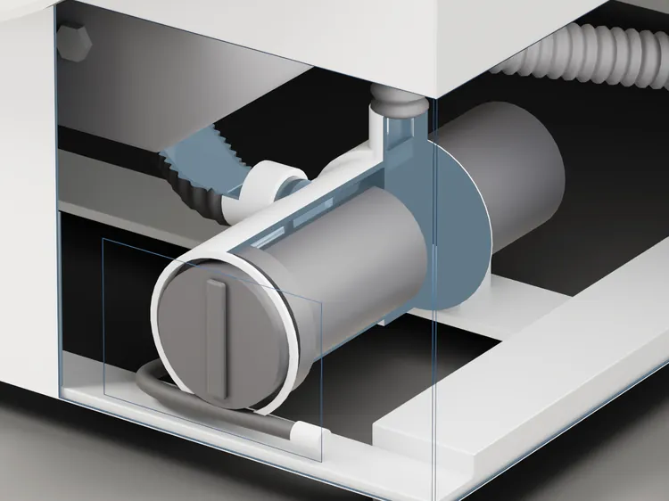 The bottom front of the washer, cut open: water standing in the hose from the tub, in the pump filter's housing and the drain pump, and the drain hose leading away.