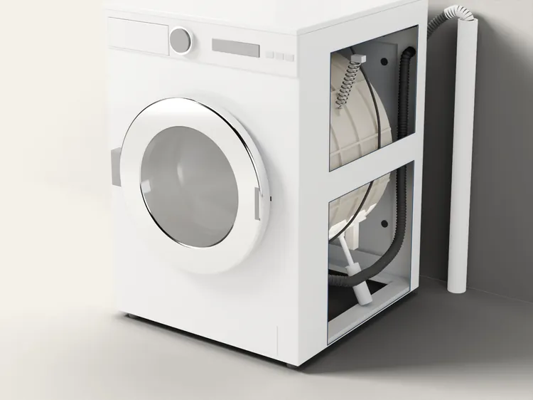 The washer cut open at the side: the outer tub, and a close-up of a shock absorber under it.